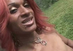 Sexy latina redhead tranny jerks her dick